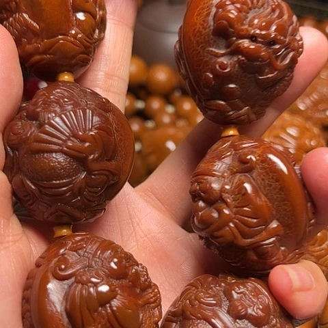 㞮***孞橄榄核手串/手链玉华龙财
