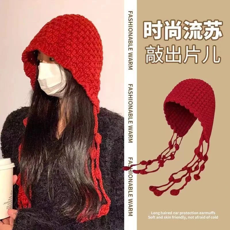 川西氛围感穿搭旅游帽子高级感出片毛线帽女红色新疆草原针织冷帽