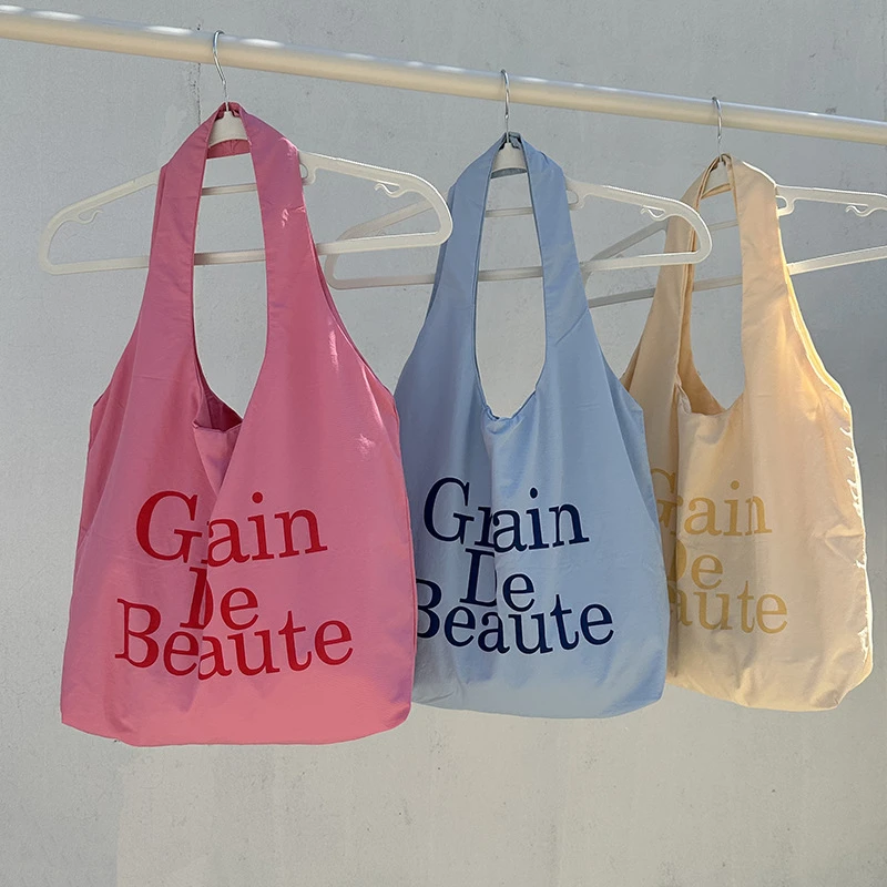 【字母印花腋下包】新款字母印花帆布包大容量单肩上课包