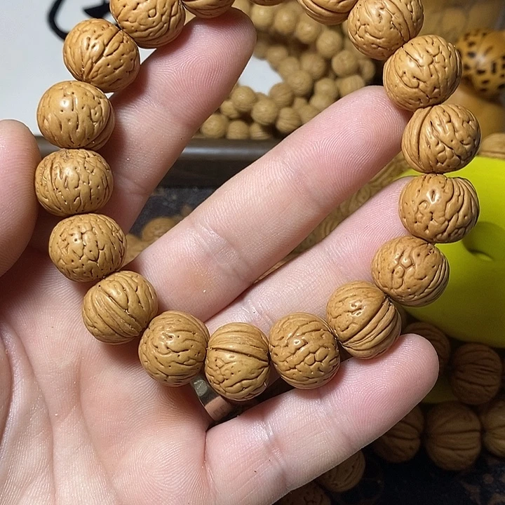 治***桃核手串顺顺利利85.8。  28