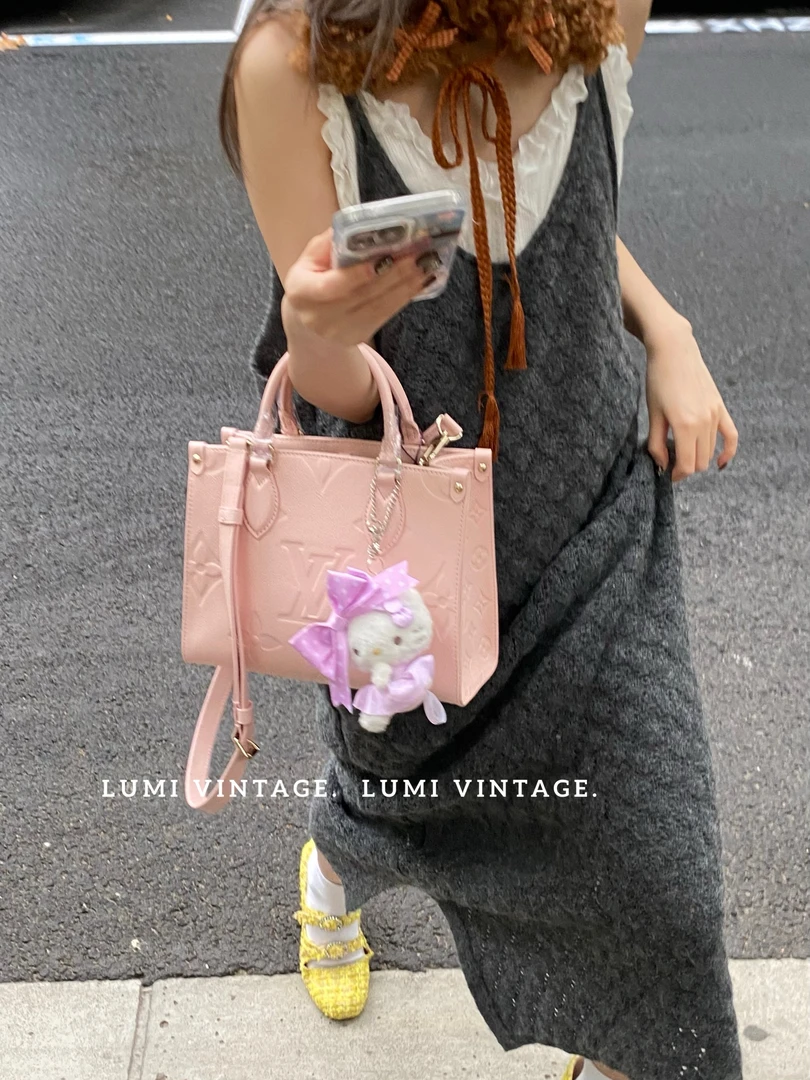 95新 LouisVuitton/路易威登 粉色牛皮压纹小号otg手提包84519060