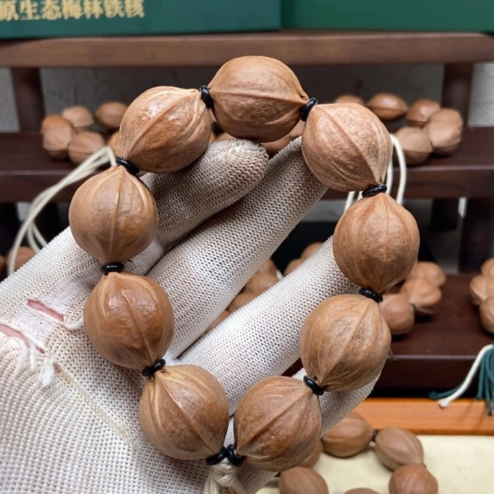 迟***迟手串橄榄核2226正四花分开付6000