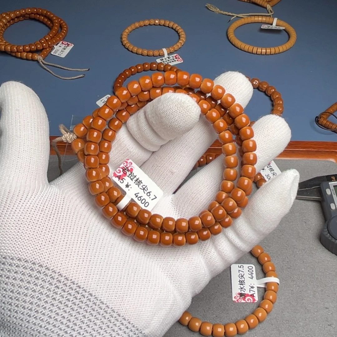 橄榄核吊坠6.7尺核尖老挝A5脖挂