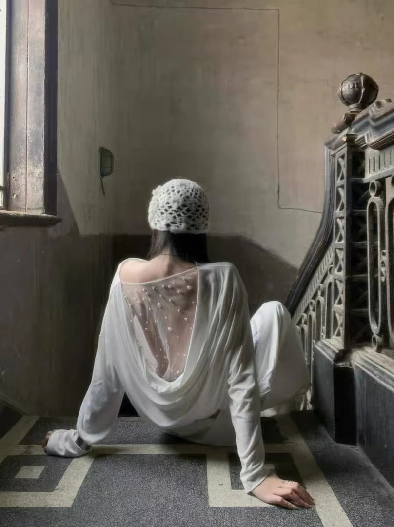 MEENI（286#）法式设计感露背长袖上衣 kc