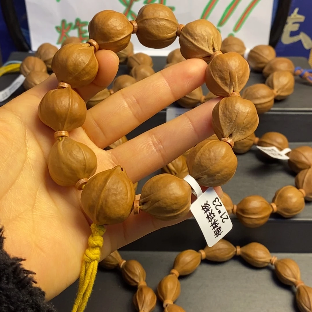 阿***蝶橄榄核手串/手链梅林铁核21/23左右