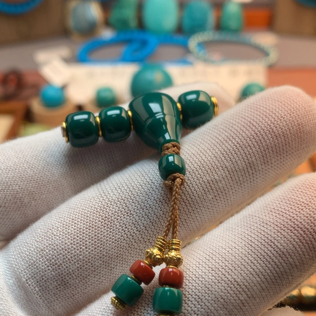 柏***技绿松石18K金镶嵌挂件