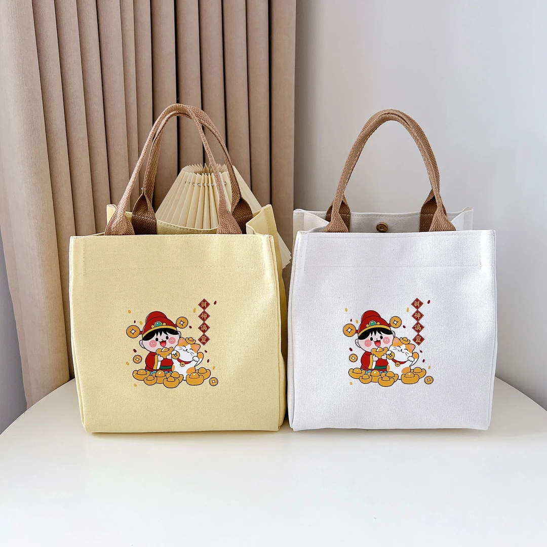 新款小方包2025可折叠布艺卡通手提包简约百搭学生上班族便当包