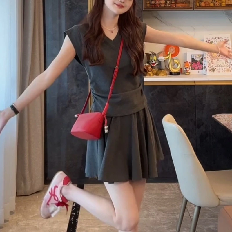 2025宝藏套装~夏季坎肩收腰上衣+A字松紧腰短裙两件套LK2502963