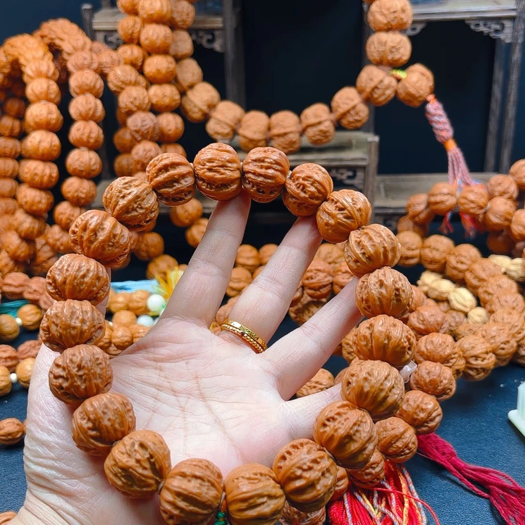 文玩核桃吊坠唐***奶核桃手持