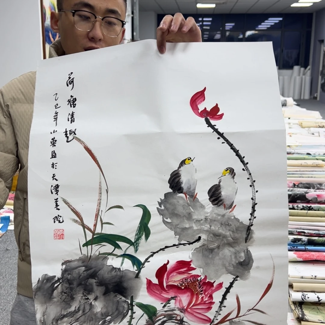 国画卖字画的小男孩