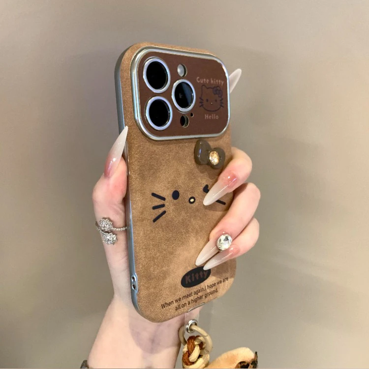 复古棕皮质表情kt猫适用于苹果16手机壳iPhone17新款15Pro全包14