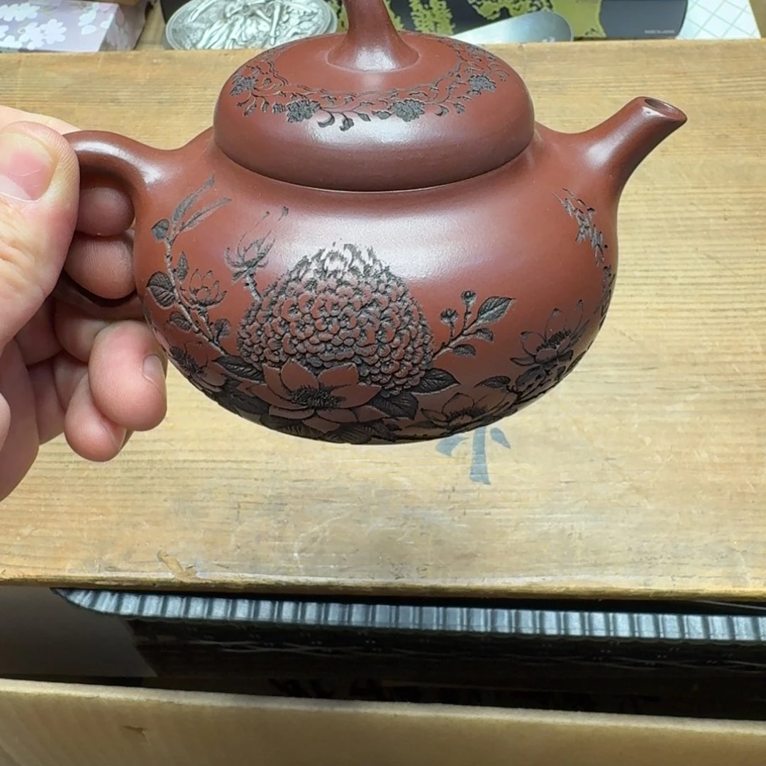 紫砂壶泡茶喝点半