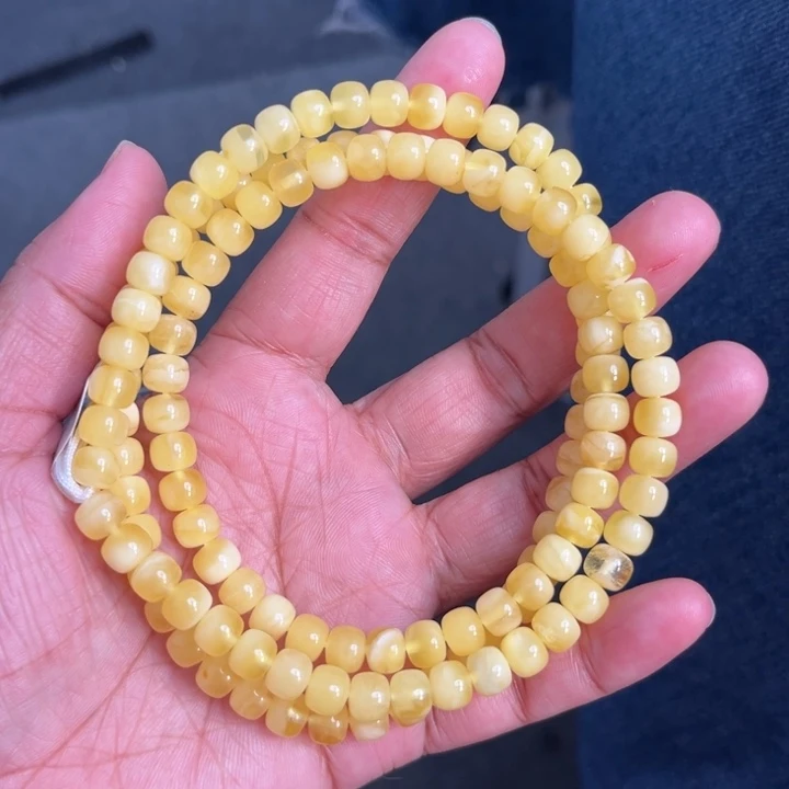 琥珀未镶嵌珠宝奇石M117号6.9+金白妖花