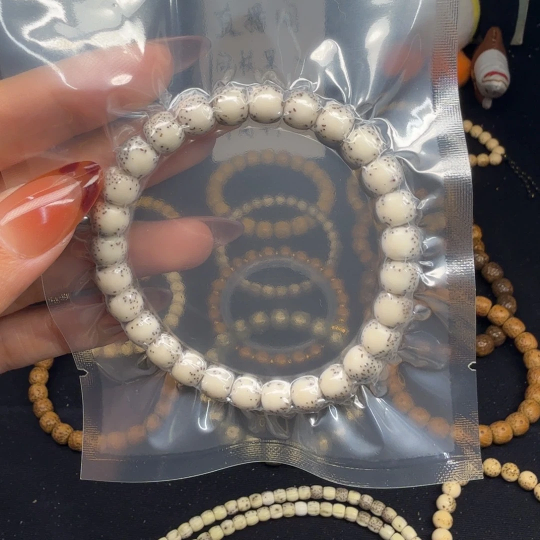 柿***子星月菩提吊坠卡8石玉河豚