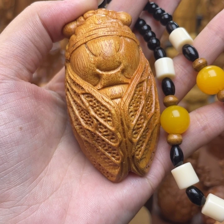 黄金檀一鸣惊人手把件