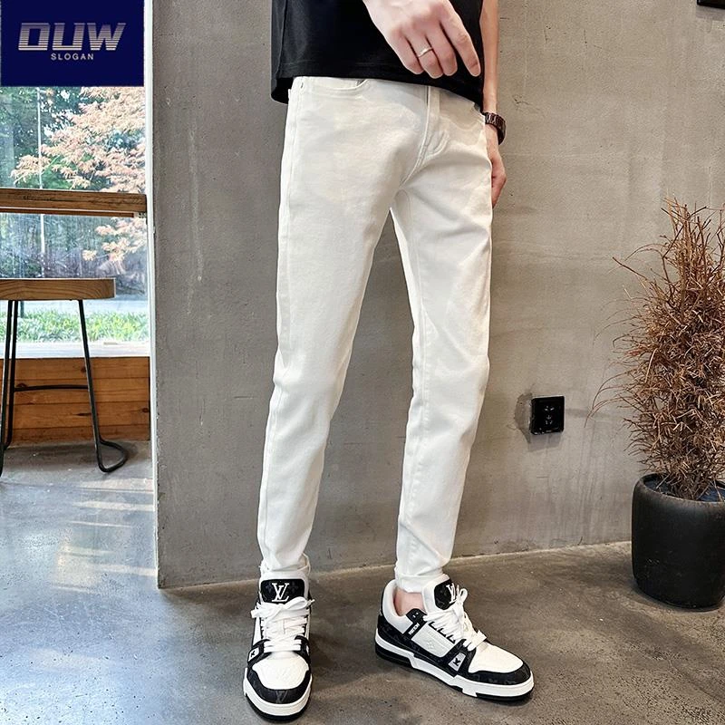 O.U.W弹力白色牛仔裤男士初秋薄款潮牌修身九分裤痞帅小脚休闲裤