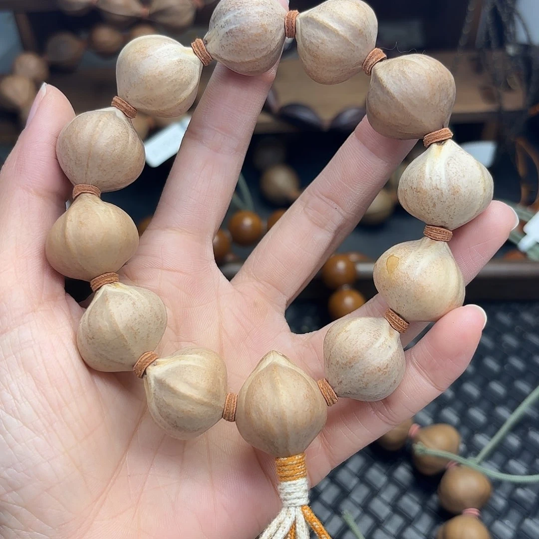 手串橄榄核08。2.2*2.3三花短圆