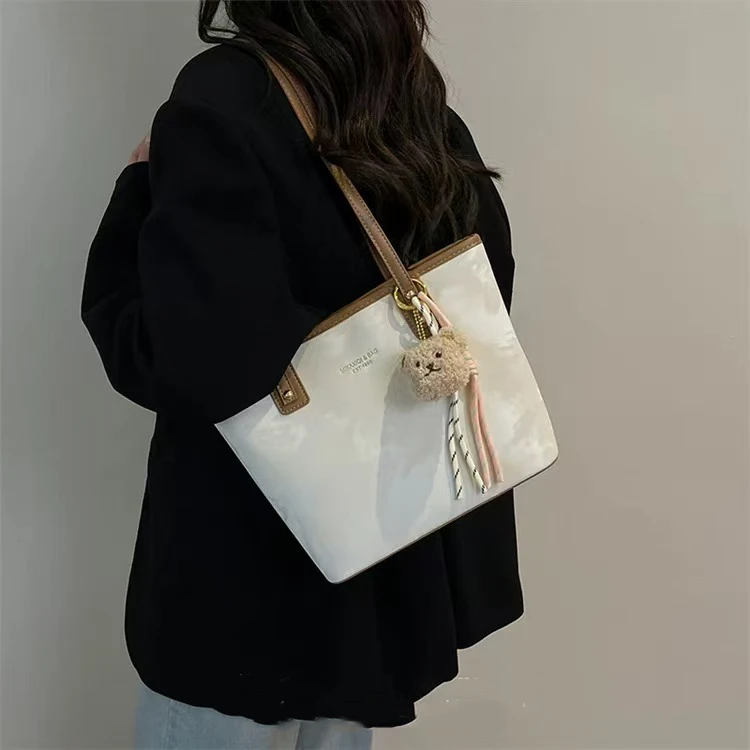 手提大容量女包包2025新款时尚托特包跨境简约单肩学生包隔层拉链