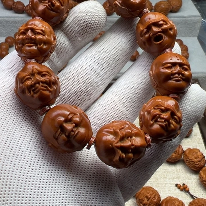 岐***心橄榄核手串橄榄核雕工艺制作