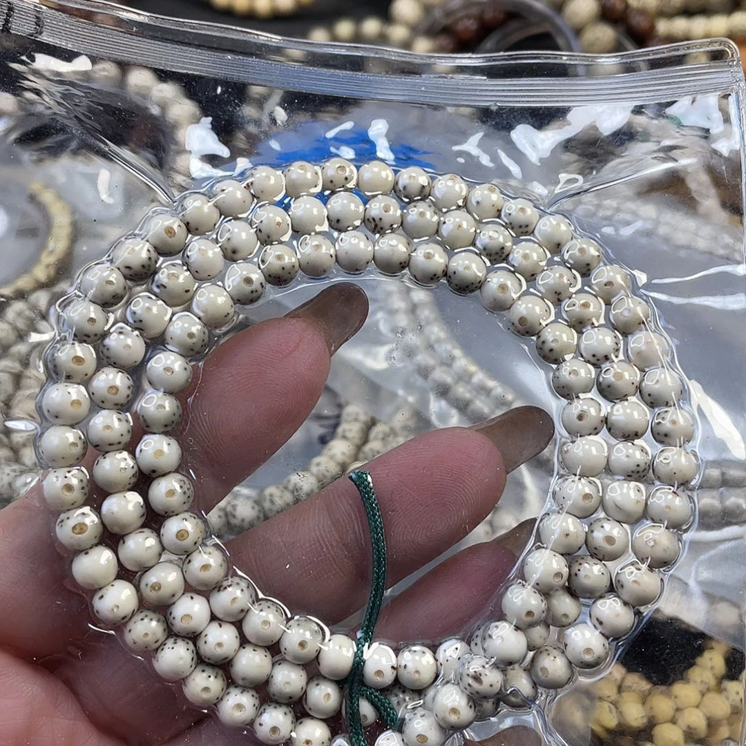 凌***起星月菩提吊坠原生态骨瓷白大留白圆珠尺寸6
