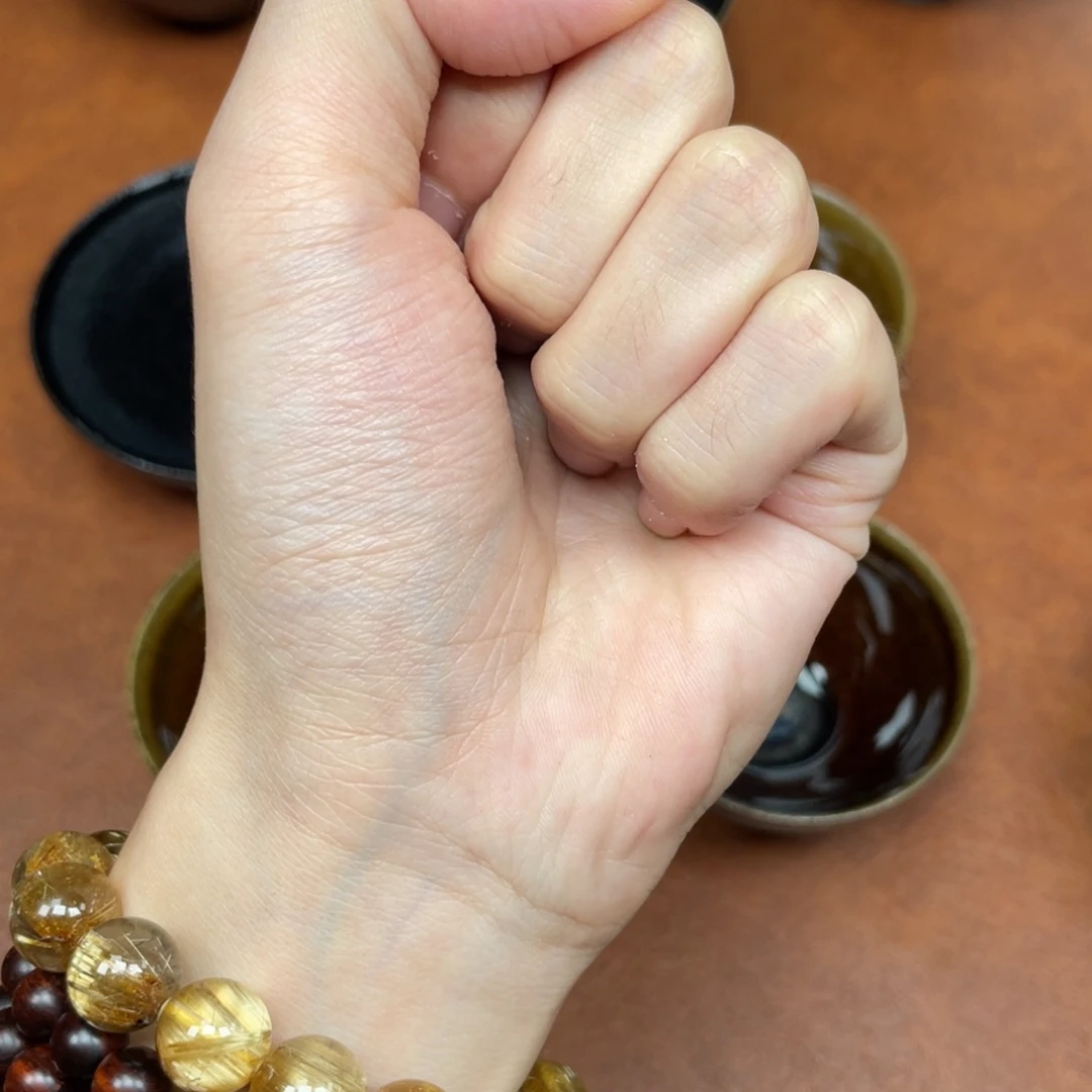 庆***春茶盏拳头。