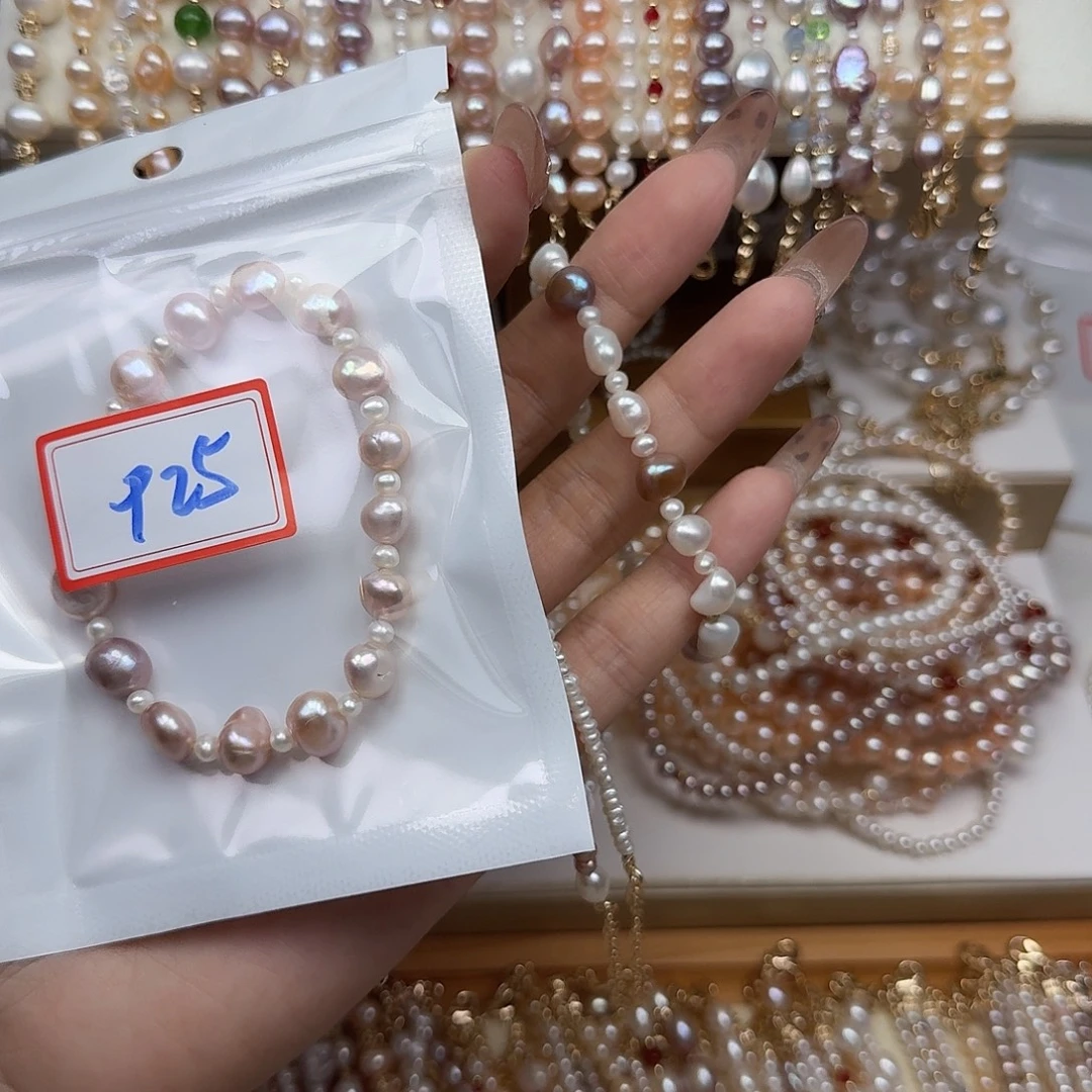 এ***豆淡水珍珠钛钢手绳