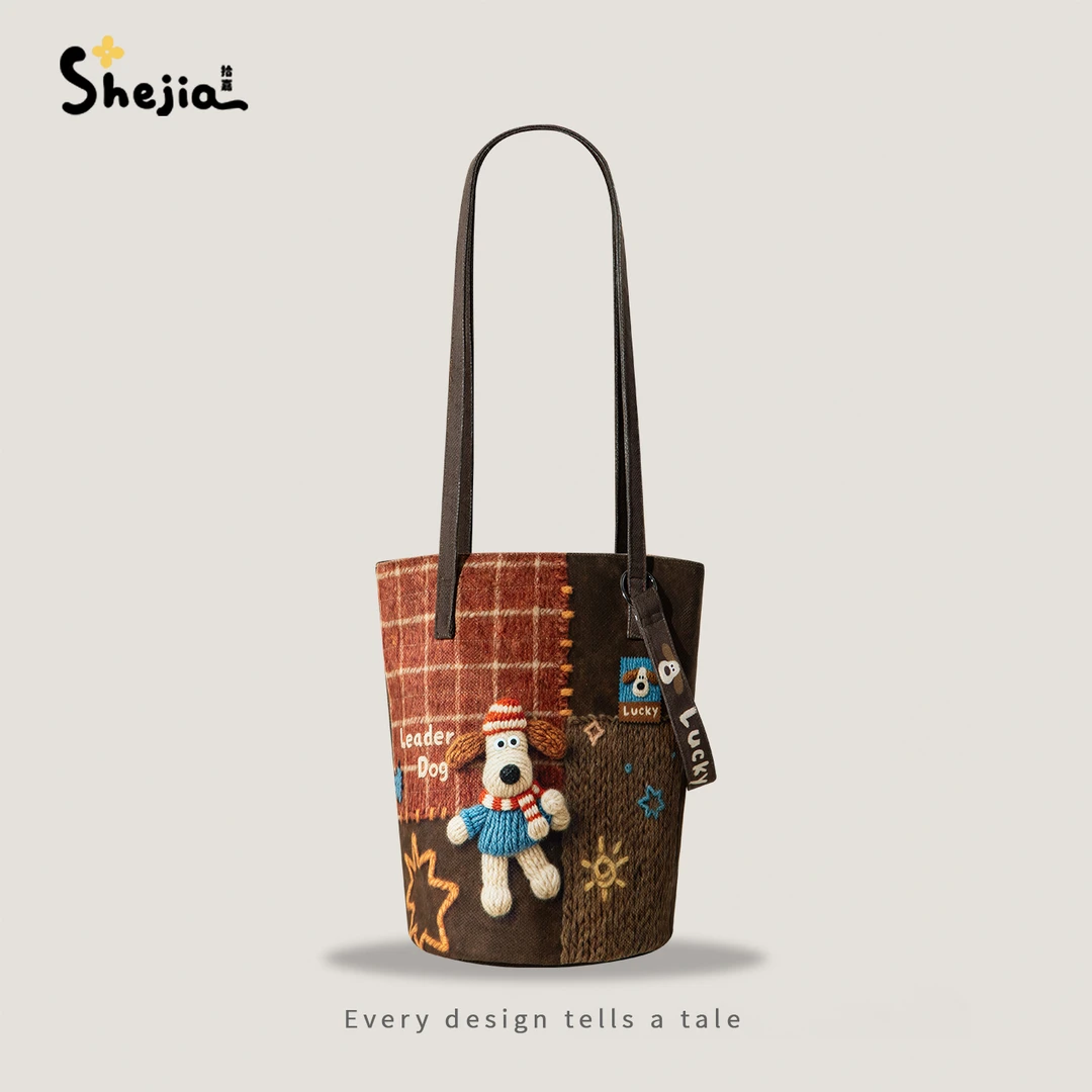 拾嘉/针织效果掌门狗单肩斜挎原创百搭文艺时尚大水桶包