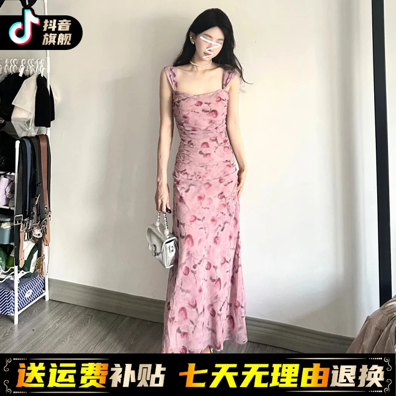 茶歇法式玫瑰碎花吊带连衣裙女夏季2024新款海边度假修身长裙小众