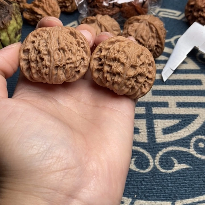 桃核把件歪磨全歪磨