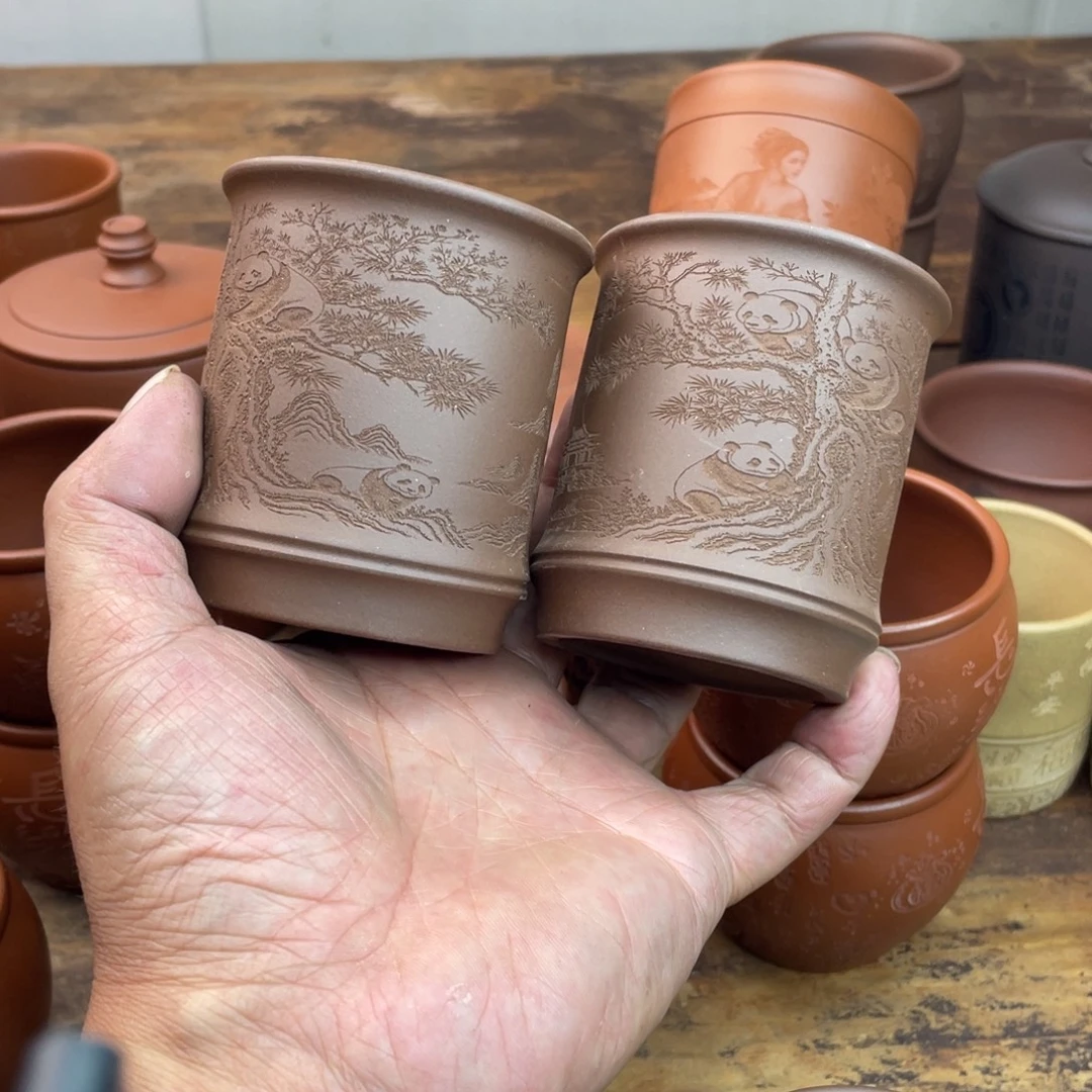 紫砂茶壶主人杯放漏紫泥