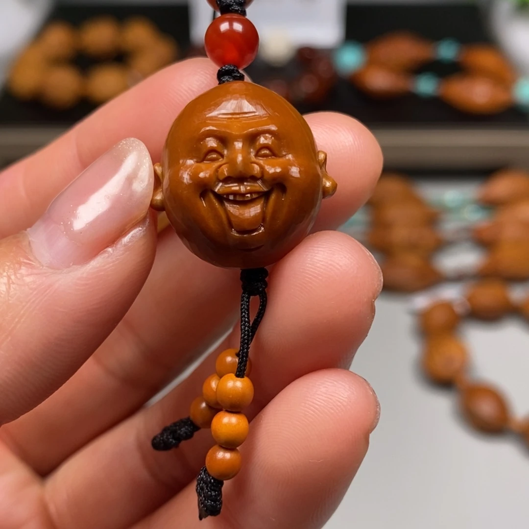 橄榄核吊坠笑佛单子