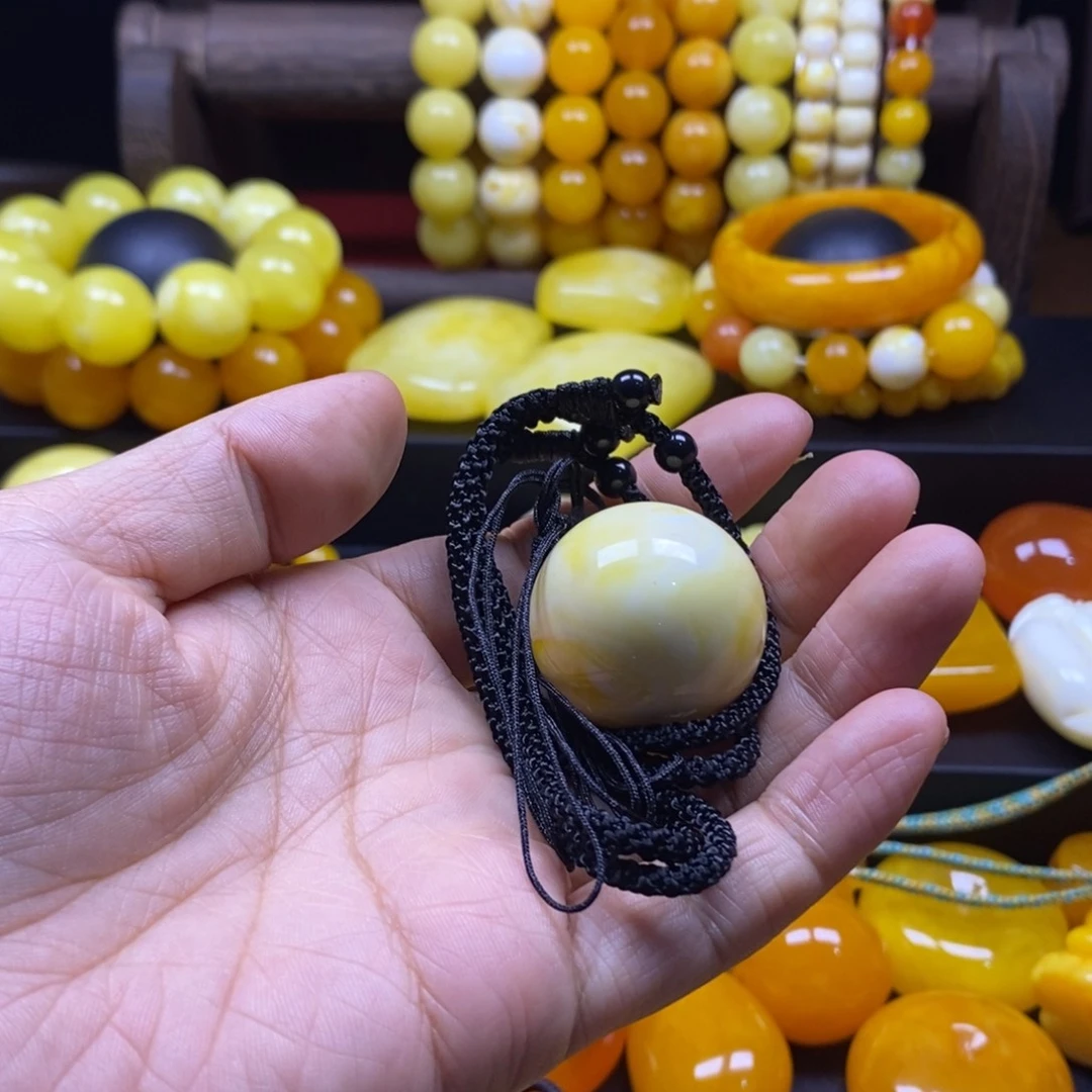 孙***睛非金属树脂全品无暇30瓷白妖花单珠