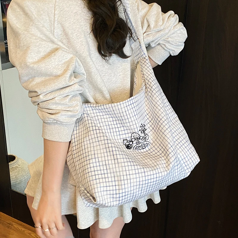 条纹帆布包包女2025新款潮韩国学院风托特包懒散风大容量斜挎包