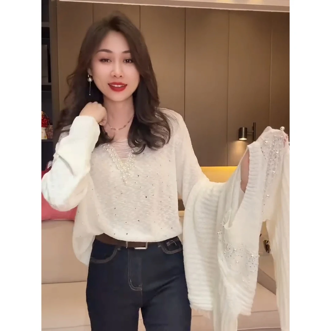 欧货秋冬新款时尚镂空钉珠设计针织衫女潮流个性圆领韩版宽松长袖