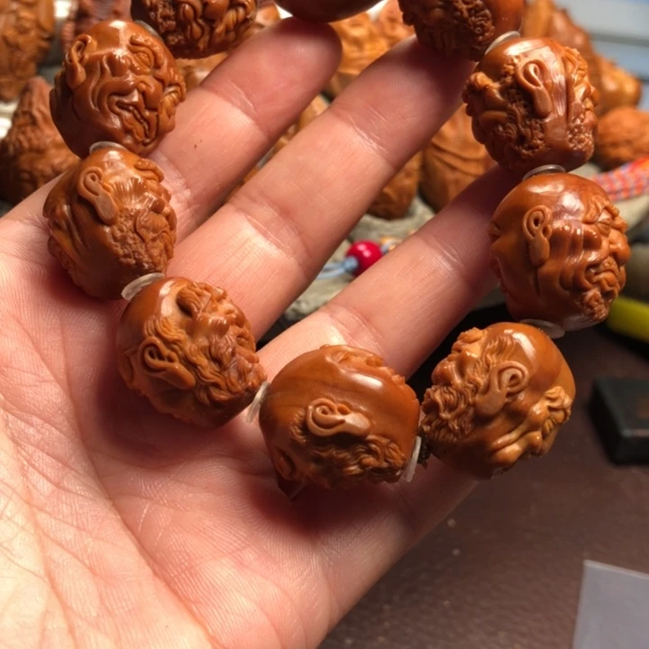 清***风橄榄核吊坠橄榄核雕刻的手把件