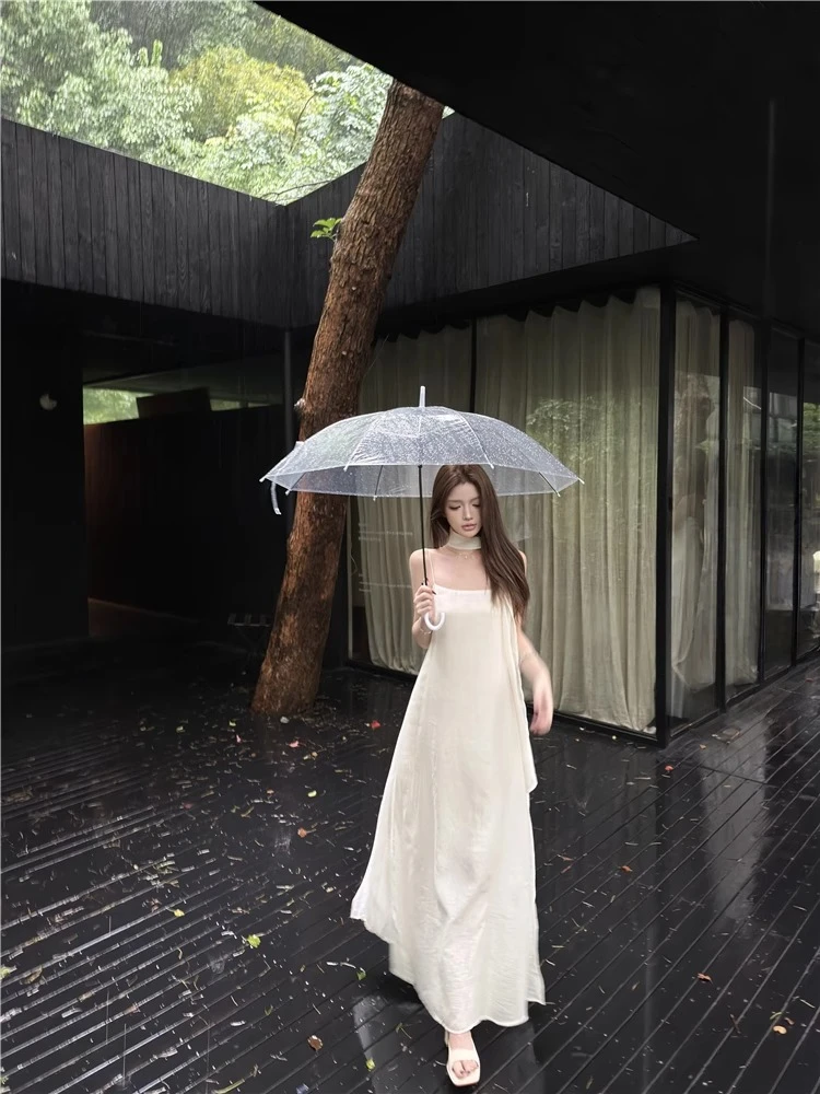 夏日出游穿搭白色吊带连衣裙女装新款仙女优雅气质绝美露肩长裙子