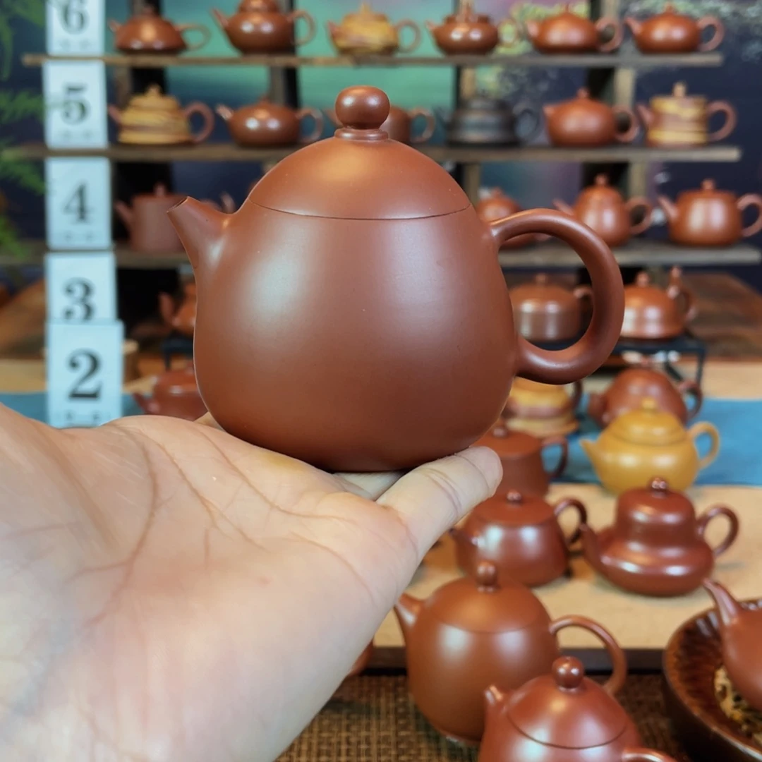 茶壶紫砂生****浪潮州手工手拉朱泥龙蛋壶