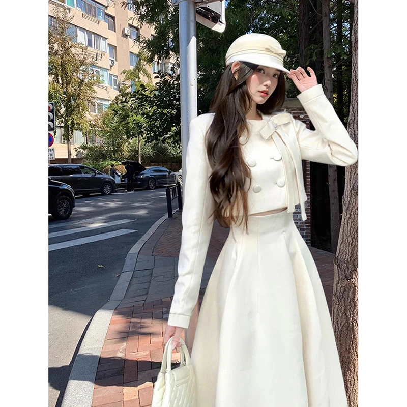 W胖颖专属大码春季新款法式珍珠蝴蝶结排扣外套+半裙套装2884