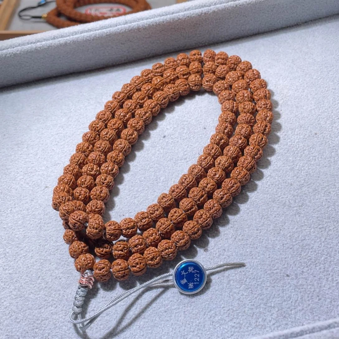 金刚菩提吊坠T****M凹底梅花10