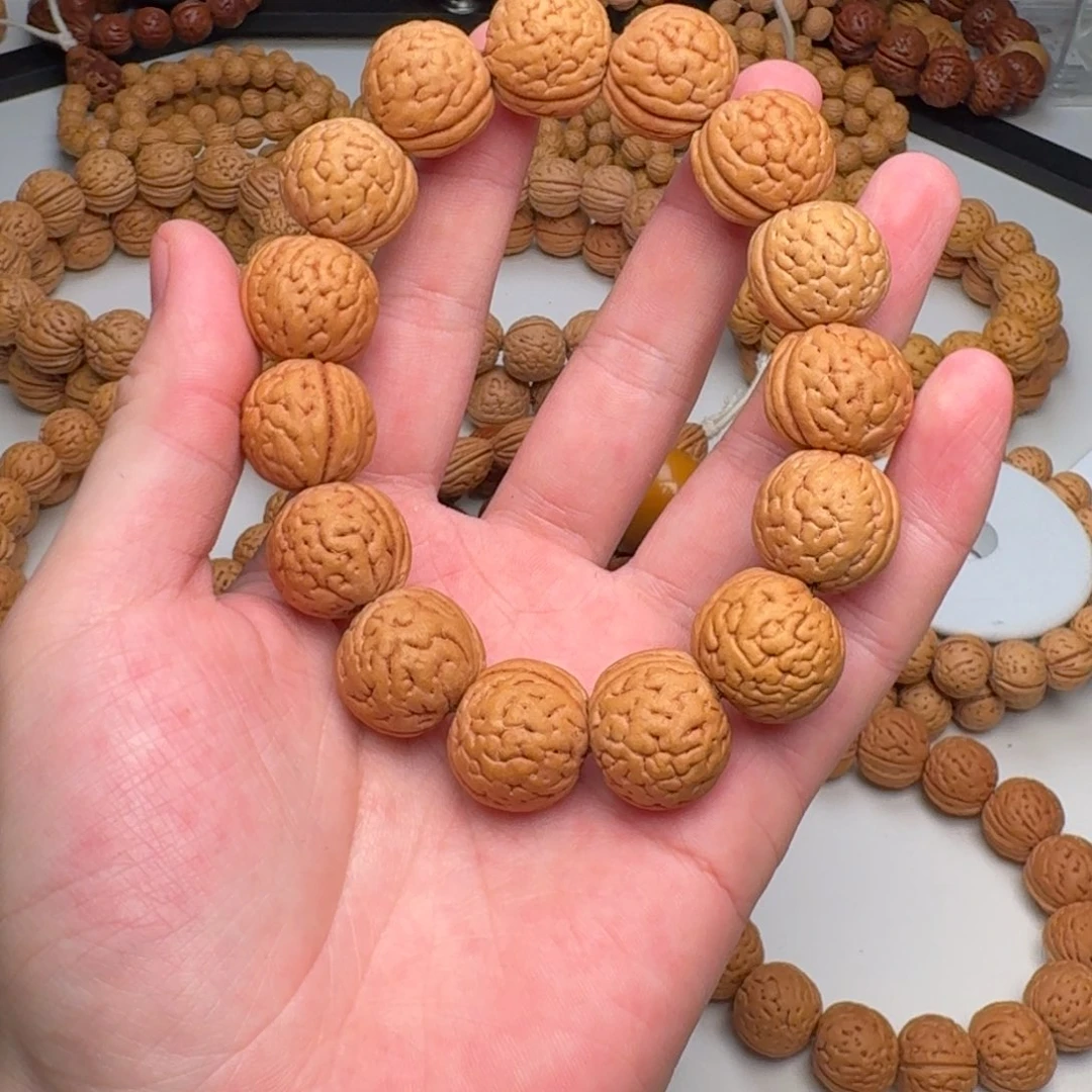 桃核手串h****e19mm+盘锦肌肉纹手串