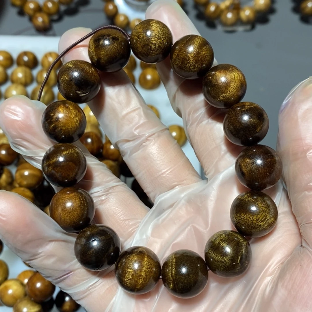 金丝楠啦*啦小叶1.5黑金手串微瑕