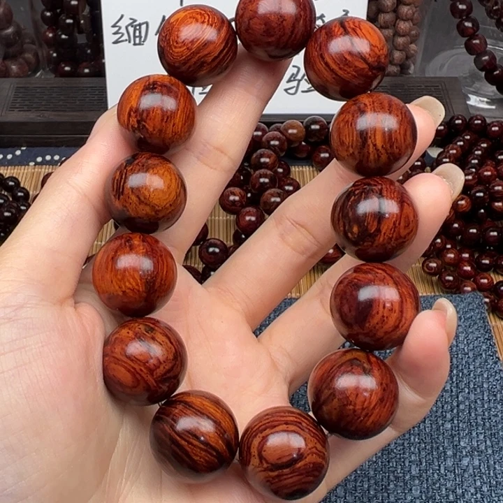 启***化藤类海南红降火焰纹1.8圆珠（瑕）