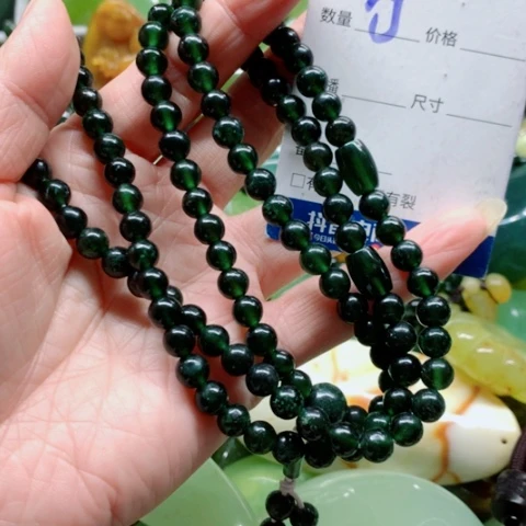 锦***宝蛇纹石玉未镶嵌手把件