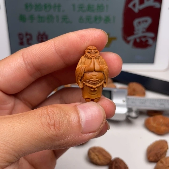 橄榄核吊坠橄榄核雕刻单子。