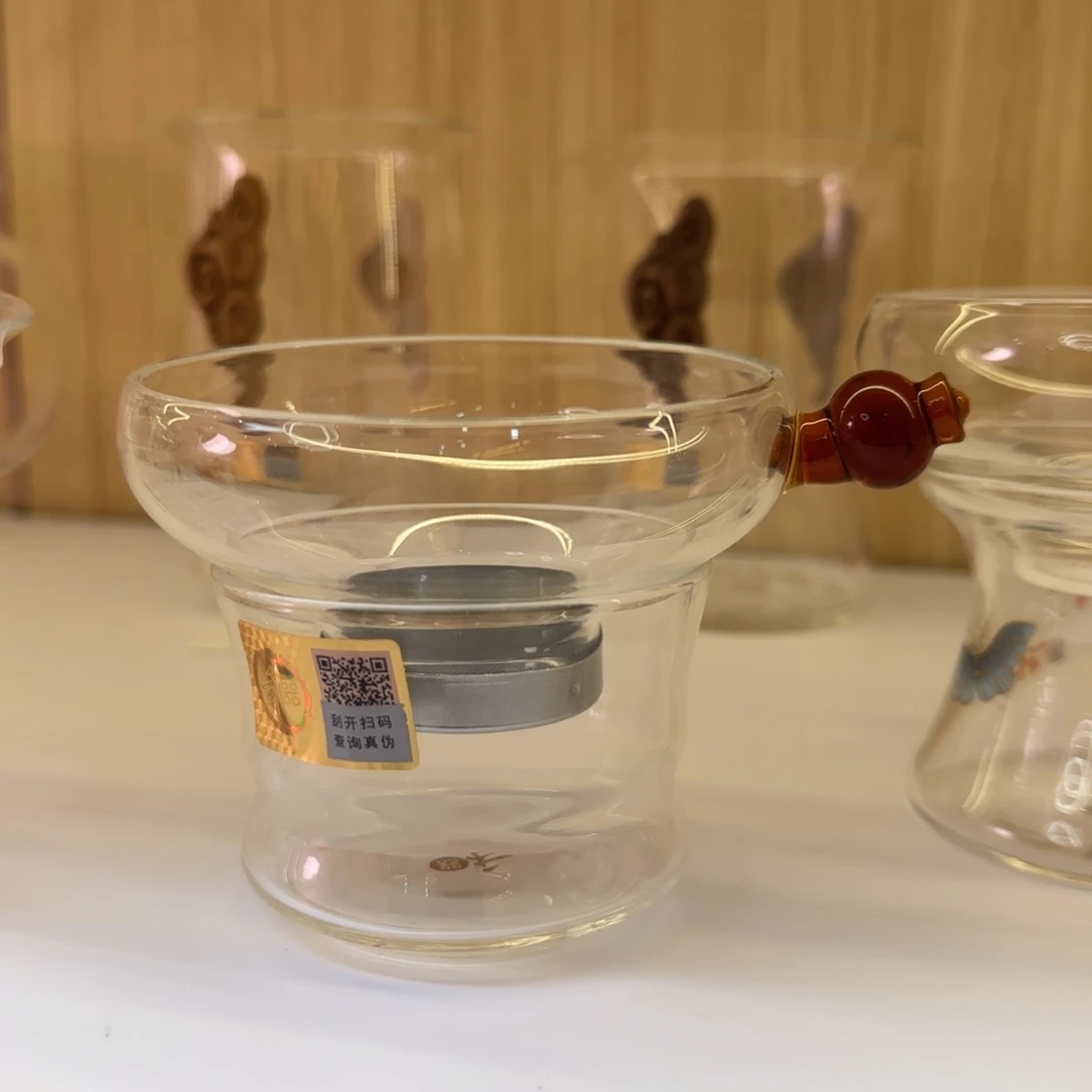 焕****琉璃手工艺品禾器奉珠不锈钢茶漏琥珀色