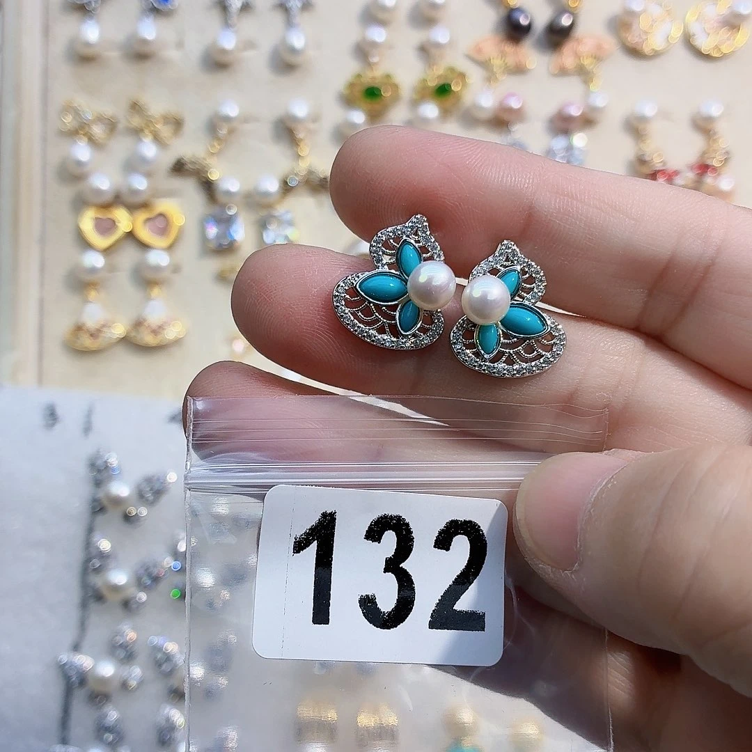 嗏***菋耳饰合金淡水珍珠