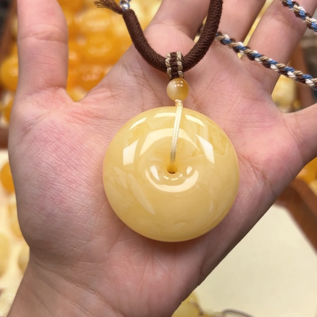 紫****琥珀未镶嵌颈饰蜜蜡