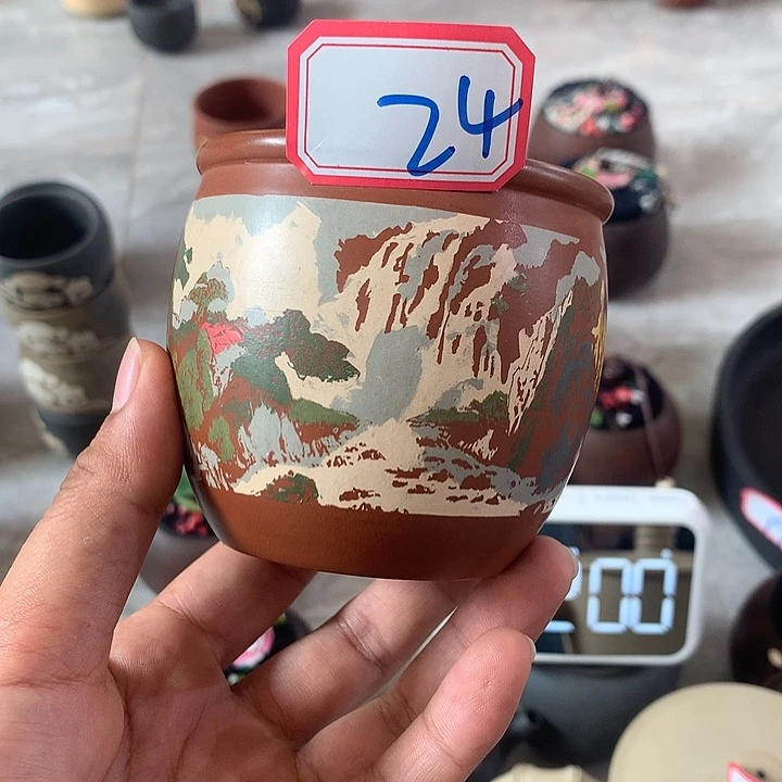 云南建水紫陶彩填壶浒*人