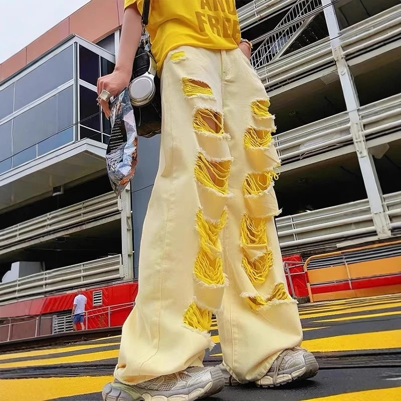 美式辣妹黄色破洞牛仔裤女夏季2025年新款设计感小众宽松阔腿长裤