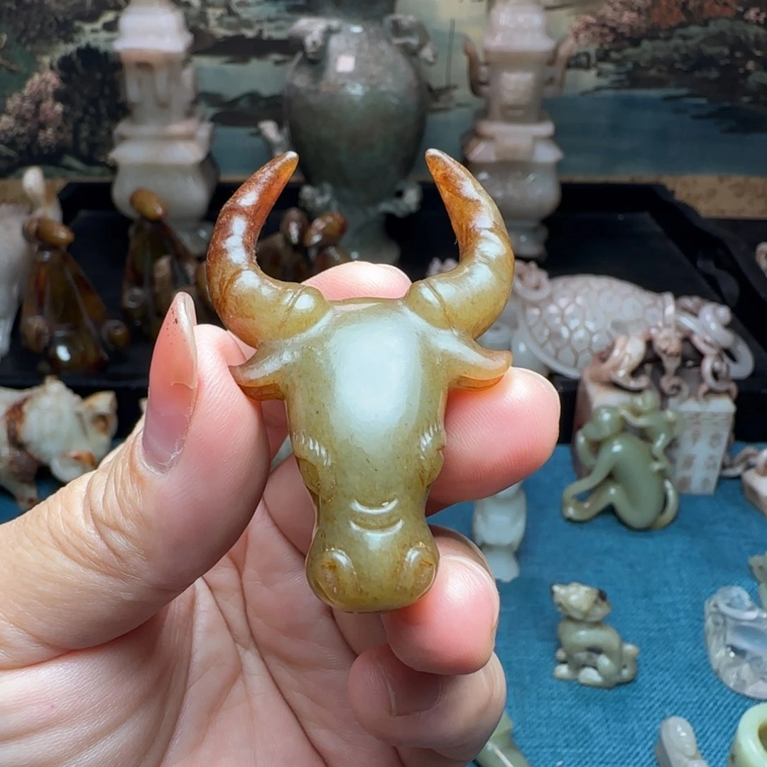 頭***了和田玉未镶嵌挂件